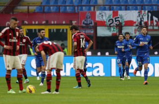MILAN, ITALY - JANUARY 06: Players of Sassuolo celebrate the equalizing goal during the Serie A match between AC Milan and US Sassuolo Calcio at Stadio Giuseppe Meazza on January 6, 2015 in Milan, Italy. (Photo by Maurizio Lagana/Getty Images)