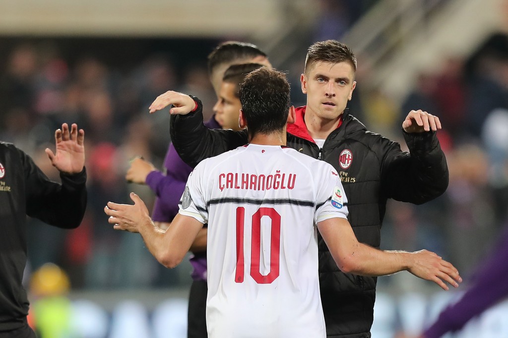 Hakan Calhanoglu e Krzysztof Piatek, Milan, Getty Images