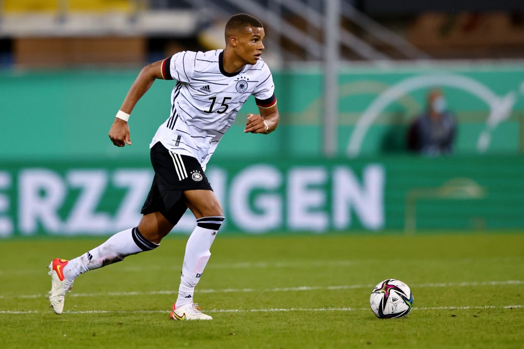 PADERBORN, GERMANY - OCTOBER 07: Malick Thiaw of Germany runs with the ball during the 2022 UEFA European Under-21 Championship Qualifier match between Germany and Israel at Benteler Arena on October 07, 2021 in Paderborn, North Rhine-Westphalia. (Photo by Christof Koepsel/Getty Images)