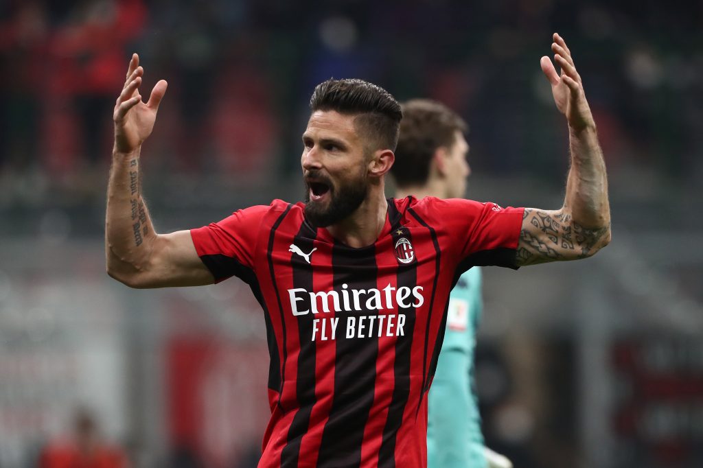 MILAN, ITALY - JANUARY 13: Olivier Giroud of AC Milan celebrates after scoring his side's opening goal during the Coppa Italia match between AC Milan and Genoa CFC at Stadio Giuseppe Meazza on January 13, 2022 in Milan, Italy. (Photo by Marco Luzzani/Getty Images)