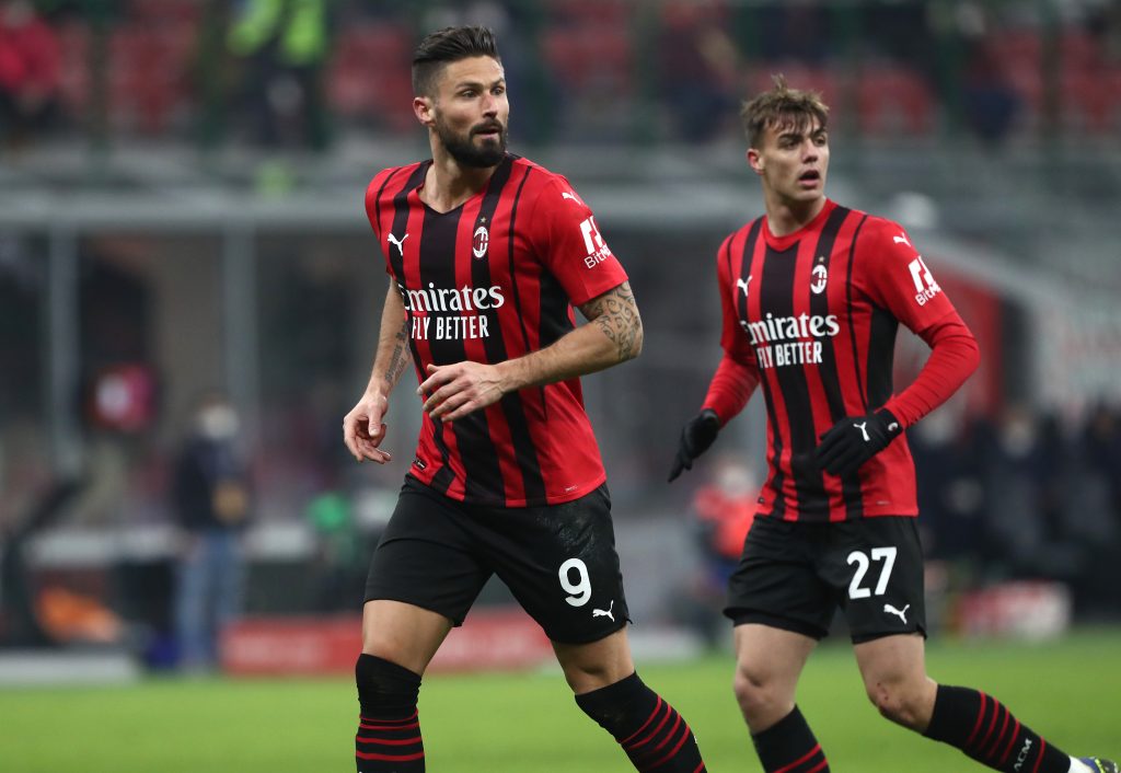MILAN, ITALY - JANUARY 13: Olivier Giroud of AC Milan and Daniel Maldini of AC Milan are pictured during the Coppa Italia match between AC Milan and Genoa CFC at Stadio Giuseppe Meazza on January 13, 2022 in Milan, Italy. (Photo by Marco Luzzani/Getty Images)