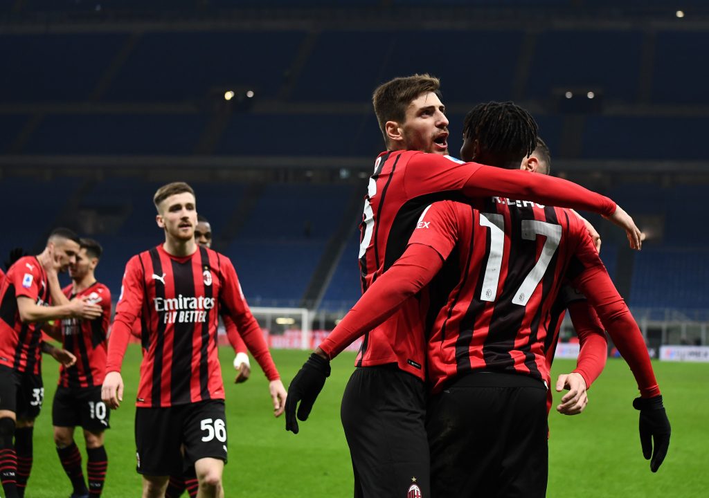 MILAN, ITALY - JANUARY 17: Rafael Leao of AC Milan celebrates with team-mates after scoring the goal during the Serie A match between AC Milan and Spezia Calcio at Stadio Giuseppe Meazza on January 17, 2022 in Milan, Italy. (Photo by Claudio Villa/AC Milan via Getty Images)