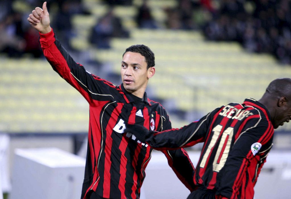 UDINE, ITALY - DECEMBER 23: Ricardo Oliveira #7 and Clarence Seedorf #10 of AC Milan celebrate during a match against Udinese at Stadio Friuli during a Match December 23, 2006 in Udine, Italy. (Photo by New Press/Getty Images)