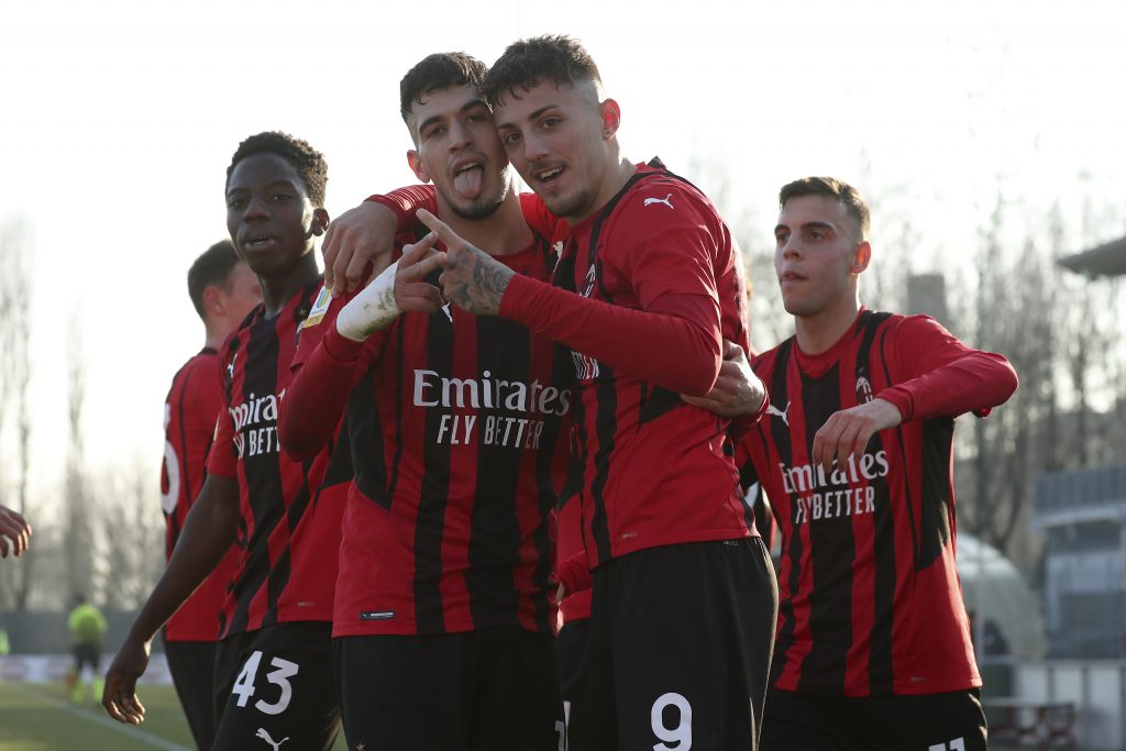 MILAN, ITALY - JANUARY 29: Marco Nasti (R) of AC Milan celebrates with Andrea Capone (L) after scoring the his team's first goal during the Primavera 1 match between AC Milan U19 and Empoli U19 at Centro Sportivo Vismara on January 29, 2022 in Milan, Italy. (Photo by AC Milan/AC Milan via Getty Images)