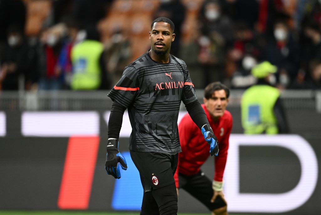 MILAN, ITALY - FEBRUARY 25: Mike Maignan of AC Milan warms up ahead before the Serie A match between AC Milan and Udinese Calcio at Stadio Giuseppe Meazza on February 25, 2022 in Milan, Italy. (Photo by Claudio Villa/AC Milan via Getty Images)