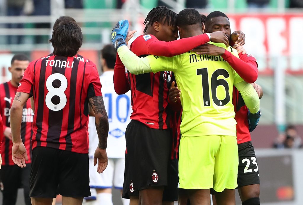 MILAN, ITALY - FEBRUARY 13: Rafael Leao of AC Milan celebrates with his team-mate Mike Maignan after scoring the opening goal during the Serie A match between AC Milan and UC Sampdoria at Stadio Giuseppe Meazza on February 13, 2022 in Milan, Italy. (Photo by Marco Luzzani/Getty Images)