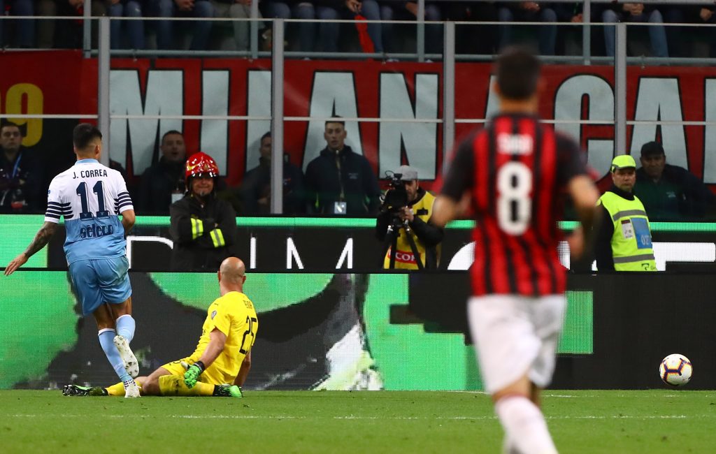MILAN, ITALY - APRIL 24: Joaquin Correa (L) of SS Lazio scores the opening goal during the TIM Cup match between AC Milan and SS Lazio at Stadio Giuseppe Meazza on April 24, 2019 in Milan, Italy. (Photo by Marco Luzzani/Getty Images)