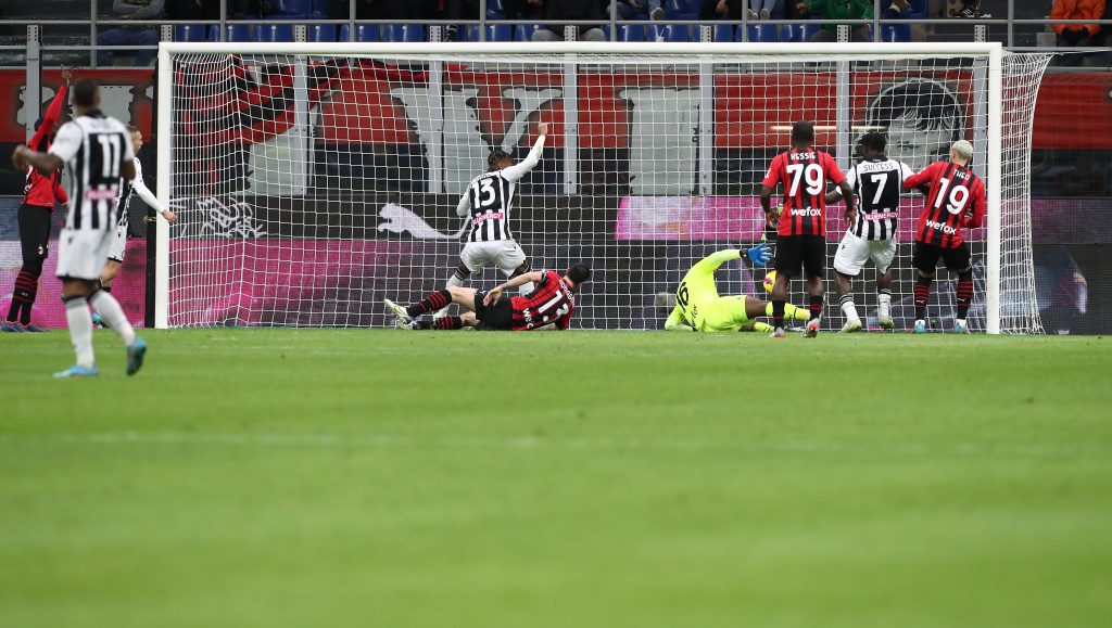 MILAN, ITALY - FEBRUARY 25: Destiny Udogie of Udinese Calcio scores his side's first goal during the Serie A match between AC Milan and Udinese Calcio at Stadio Giuseppe Meazza on February 25, 2022 in Milan, Italy. (Photo by Marco Luzzani/Getty Images)