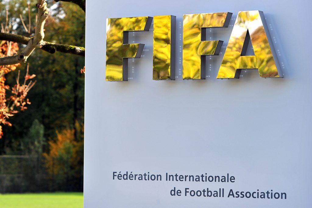 ZURICH, SWITZERLAND - OCTOBER 20: The FIFA logo is seen outside the FIFA headquarters prior to the FIFA Executive Committee Meeting on October 20, 2011 in Zurich, Switzerland. During their third meeting of the year, held over two days, the FIFA Executive Committee will approve the match schedules for the FIFA Confederations Cup Brazil 2013 and the 2014 FIFA World Cup Brazil. (Photo by Harold Cunningham/Getty Images)