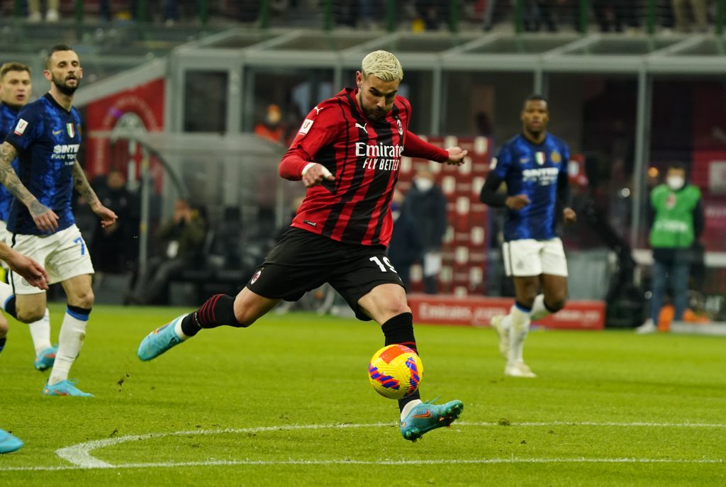 MILAN, ITALY - MARCH 01: Théo Hernández of AC Milan kicks the ball during the Coppa Italia Semi Final 1st Leg match between AC Milan and FC Internazionale at Stadio Giuseppe Meazza on March 01, 2022 in Milan, Italy. (Photo by Pier Marco Tacca/AC Milan via Getty Images)