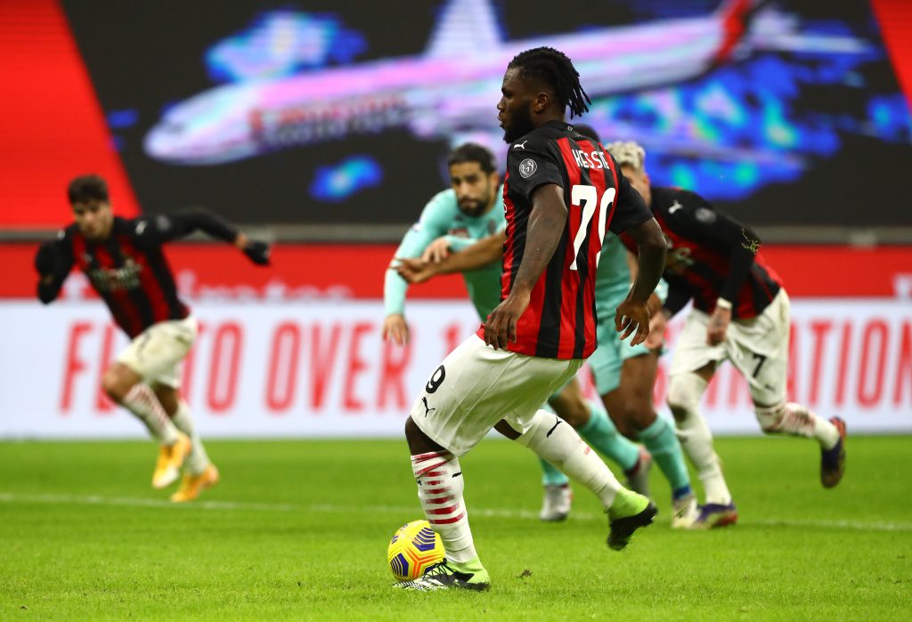 MILAN, ITALY - JANUARY 09: Franck Kessie of Milan scores their sides second goal form the penalty spot during the Serie A match between AC Milan and Torino FC at Stadio Giuseppe Meazza on January 09, 2021 in Milan, Italy. Sporting stadiums around Italy remain under strict restrictions due to the Coronavirus Pandemic as Government social distancing laws prohibit fans inside venues resulting in games being played behind closed doors. (Photo by Marco Luzzani/Getty Images)