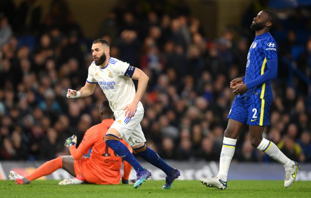 LONDON, ENGLAND - APRIL 06: Karim Benzema of Real Madrid celebrates after scoring their team's third goal and their hat trick during the UEFA Champions League Quarter Final Leg One match between Chelsea FC and Real Madrid at Stamford Bridge on April 06, 2022 in London, England. (Photo by Mike Hewitt/Getty Images)