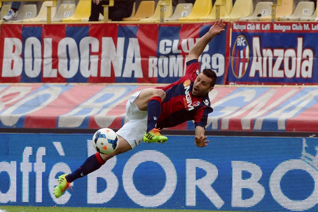 BOLOGNA, ITALY - APRIL 13: Archimede Morleo # 3 of Bologna FC in action during the Serie A match between Bologna FC and Parma FC at Stadio Renato Dall'Ara on April 13, 2014 in Bologna, Italy. (Photo by Mario Carlini / Iguana Press/Getty Images)