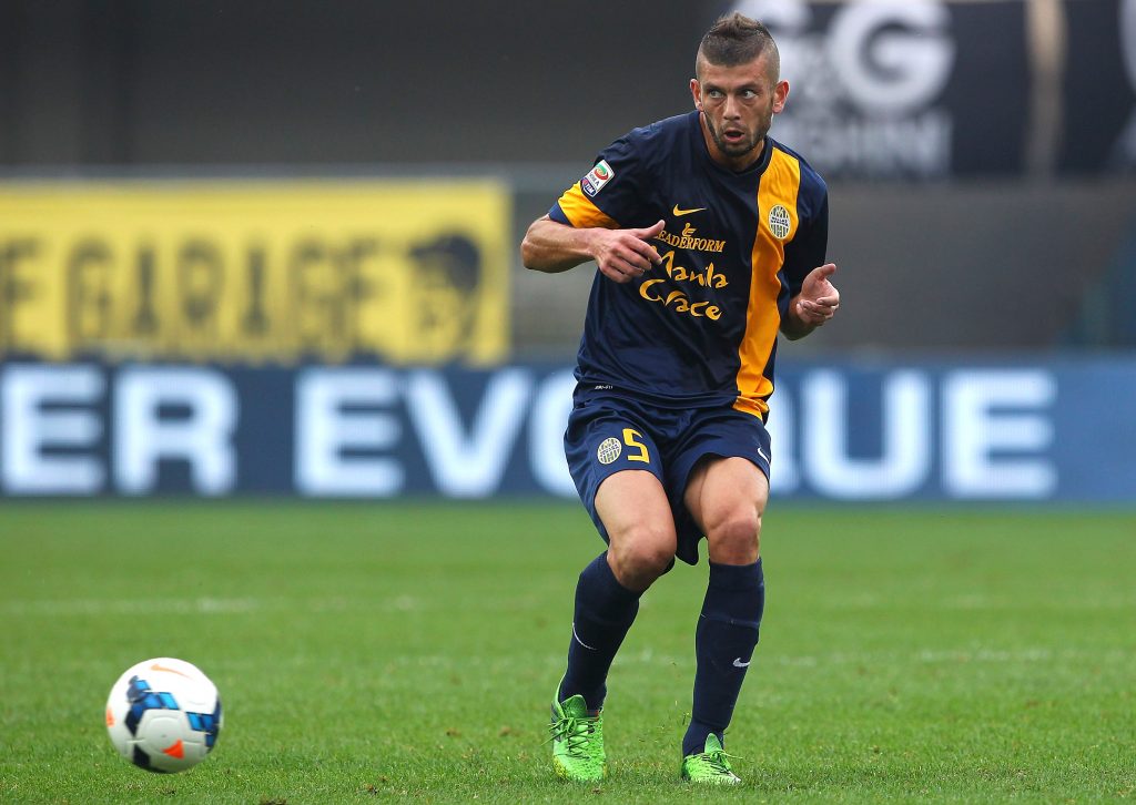 VERONA, ITALY - SEPTEMBER 29: Massimo Donati of Hellas Verona FC in action during the Serie A match between Hellas Verona FC and AS Livorno Calcio at Stadio Marc'Antonio Bentegodi on September 29, 2013 in Verona, Italy. (Photo by Marco Luzzani/Getty Images)