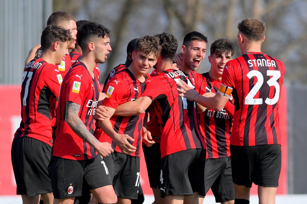 MILAN, ITALY - MARCH 09: Team of AC Milan celebrate after scoring the opening goal during the Primavera 1 match between AC Milan U19 U19 and Lecce Berretti at Campo Sportivo Vismara on March 09, 2022 in Milan, Italy. (Photo by AC Milan/AC Milan via Getty Images)