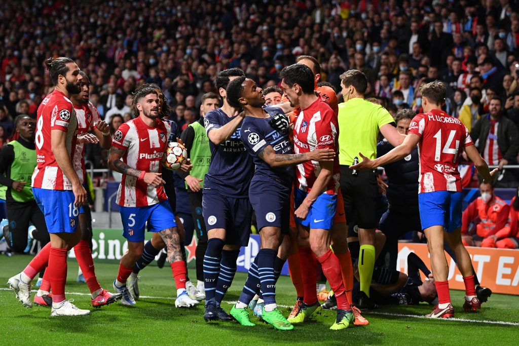 MADRID, SPAIN - APRIL 13: İlkay Gundogan and Raheem Sterling of Manchester City clash with Jan Oblak and Stefan Savic of Atletico Madrid during the UEFA Champions League Quarter Final Leg Two match between Atletico Madrid and Manchester City at Wanda Metropolitano on April 13, 2022 in Madrid, Spain. (Photo by Shaun Botterill/Getty Images)