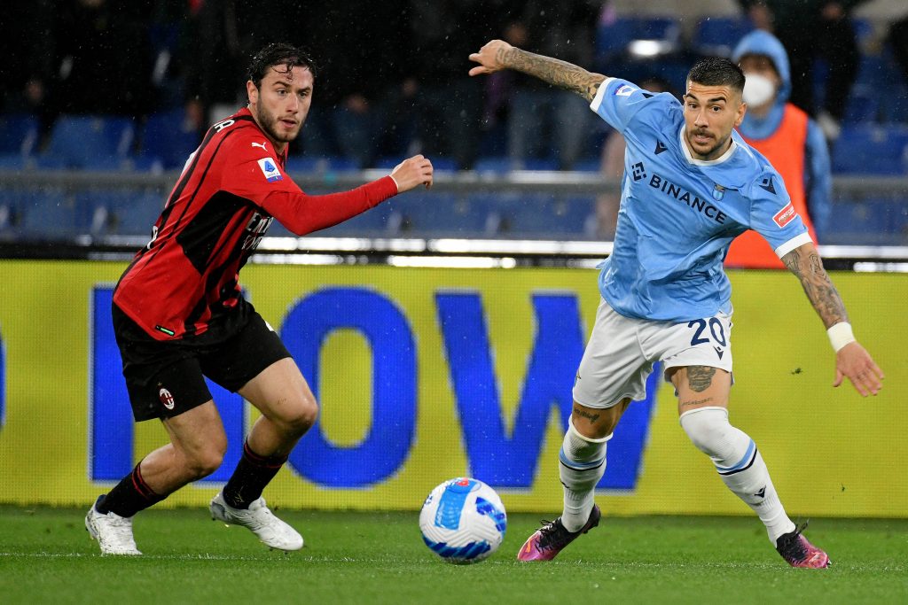 ROME, ITALY - APRIL 24: Mattia Zaccagni of SS Lazio compete for the ball with Davide Calabria of AC MIlan during the Serie A match between SS Lazio and AC Milan at Stadio Olimpico on April 24, 2022 in Rome, Italy. (Photo by Marco Rosi - SS Lazio/Getty Images)