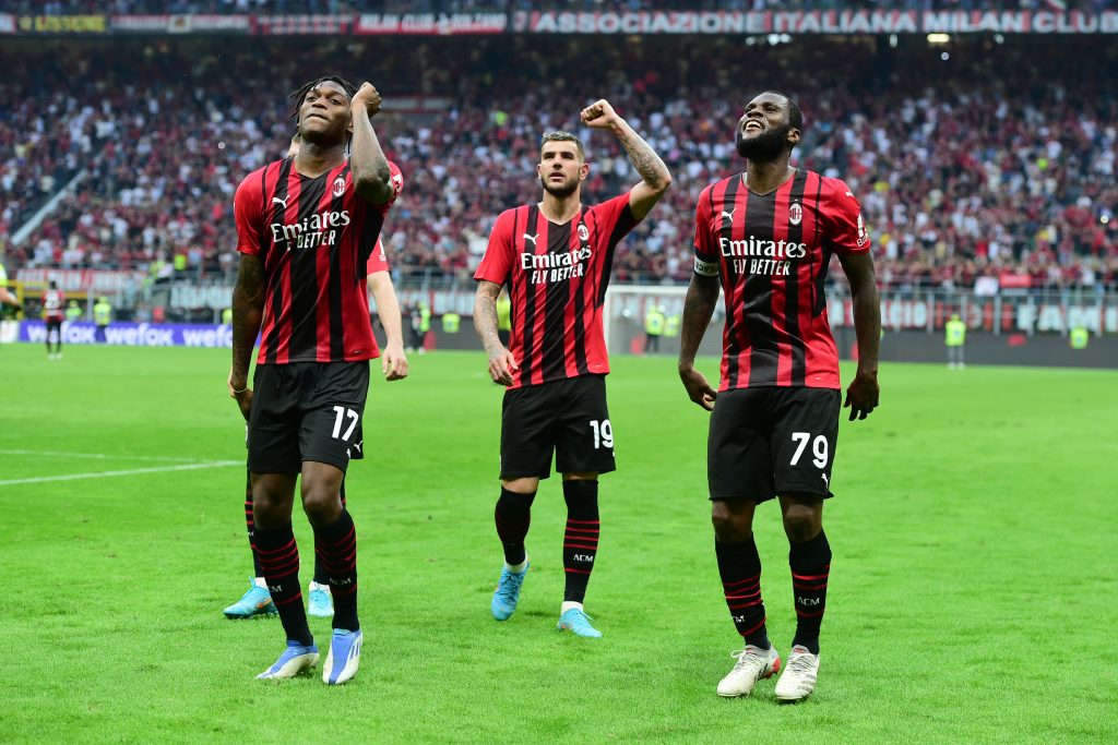 MILAN, ITALY - MAY 15: (L-R) Rafael Leao, Theo Hernandez and Franck Kessie of AC Milan celebrate the victory at the end of the Serie A match between AC Milan and Atalanta BC at Stadio Giuseppe Meazza on May 15, 2022 in Milan, Italy. (Photo by Pier Marco Tacca/AC Milan via Getty Images)