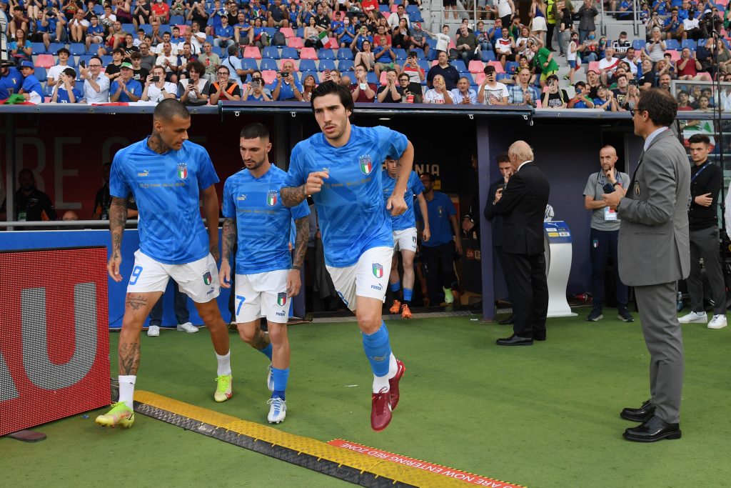 BOLOGNA, ITALY - JUNE 04: Gianluca Scamacca, Matteo Politano and Sandro Tonali of Italy walk out for their warm up prior to the UEFA Nations League League A Group 3 match between Italy and Germany at Renato Dall'Ara Stadium on June 04, 2022 in Bologna, Italy. (Photo by Claudio Villa/Getty Images)