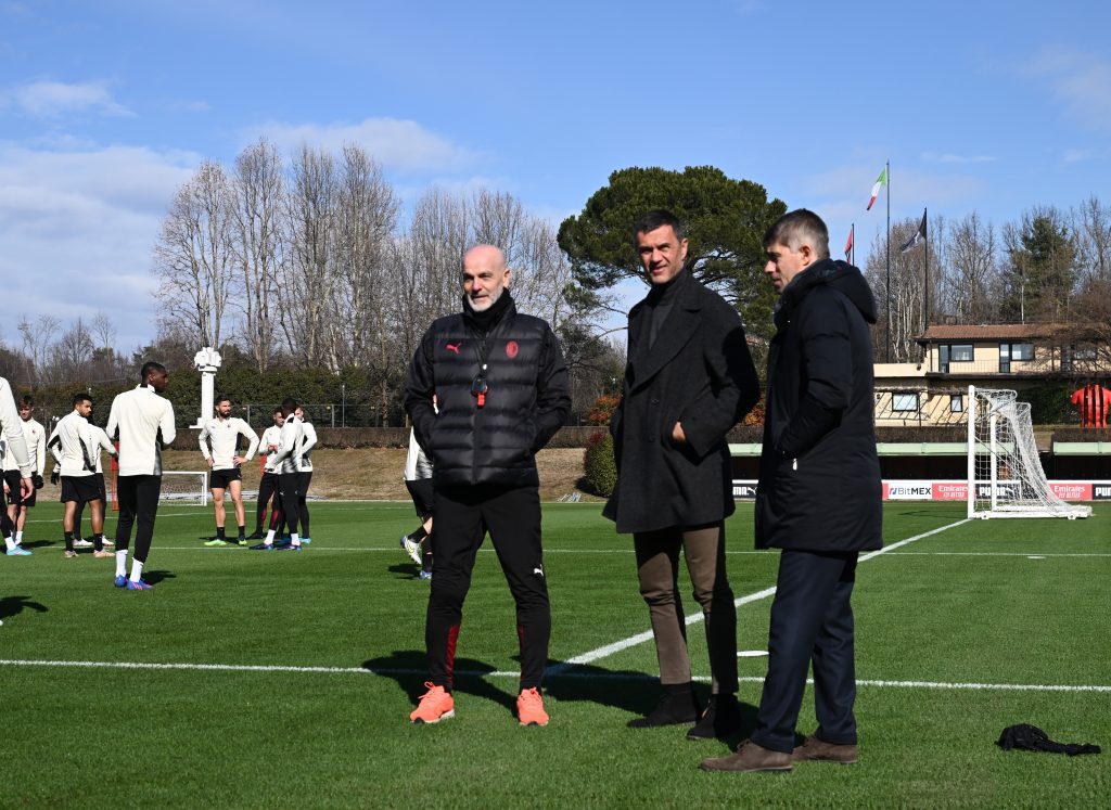 CAIRATE, ITALY - FEBRUARY 16: Head coach AC Milan Stefano Pioli, Technical Area Director AC Milan Paolo Maldini and AC Milan Sport Director Frederic Massara attend during an AC Milan training session at Milanello on February 16, 2022 in Cairate, Italy. (Photo by Claudio Villa/AC Milan via Getty Images)