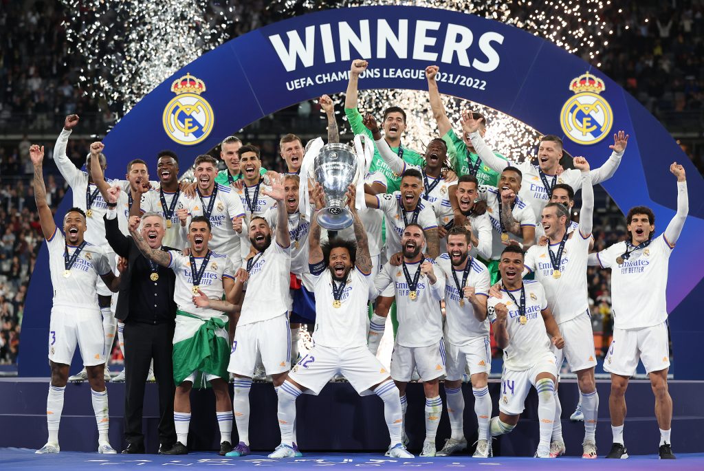 PARIS, FRANCE - MAY 28: Marcelo of Real Madrid lifts the UEFA Champions League trophy after their sides victory during the UEFA Champions League final match between Liverpool FC and Real Madrid at Stade de France on May 28, 2022 in Paris, France. (Photo by Julian Finney/Getty Images)
