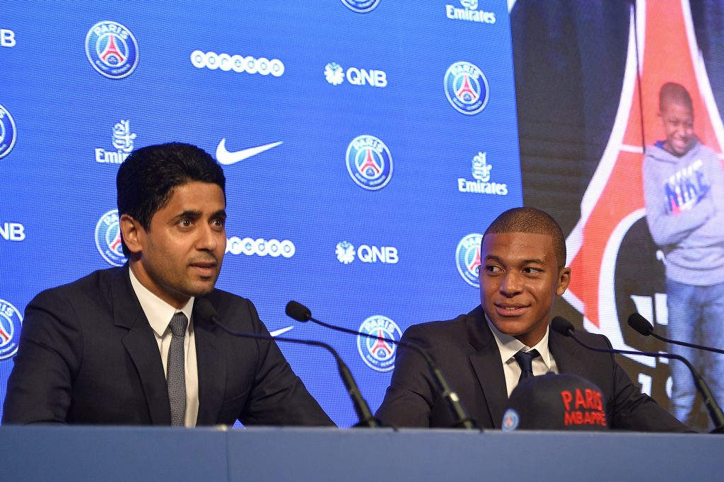 PARIS, FRANCE - SEPTEMBER 06: (L-R) Paris Saint-Germain President Nasser Al Khelaifi and new signing Kylian Mbappe speak to the media during a press conference at the Parc des Princes on September 6, 2017 in Paris, France. Kylian Mbappe signed a five year contract for 180 Million Euro. (Photo by Aurelien Meunier/Getty Images)