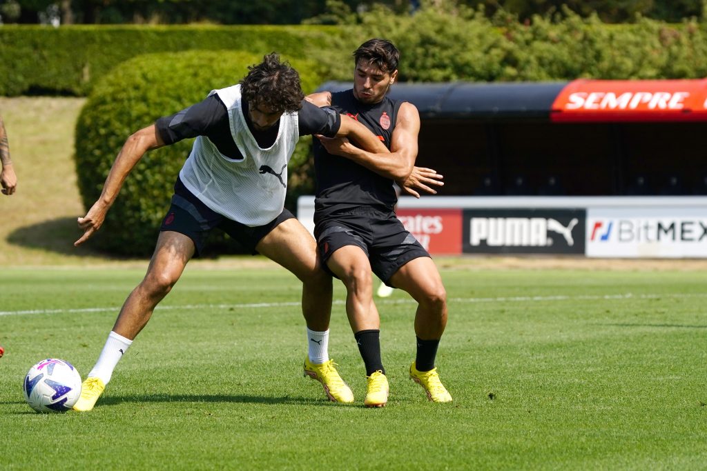 CAIRATE, ITALY - AUGUST 09: Yacine Adli and Brahim Diaz in action during an AC Milan training session at Milanello on August 09, 2022 in Cairate, Italy. (Photo by Pier Marco Tacca/AC Milan via Getty Images)