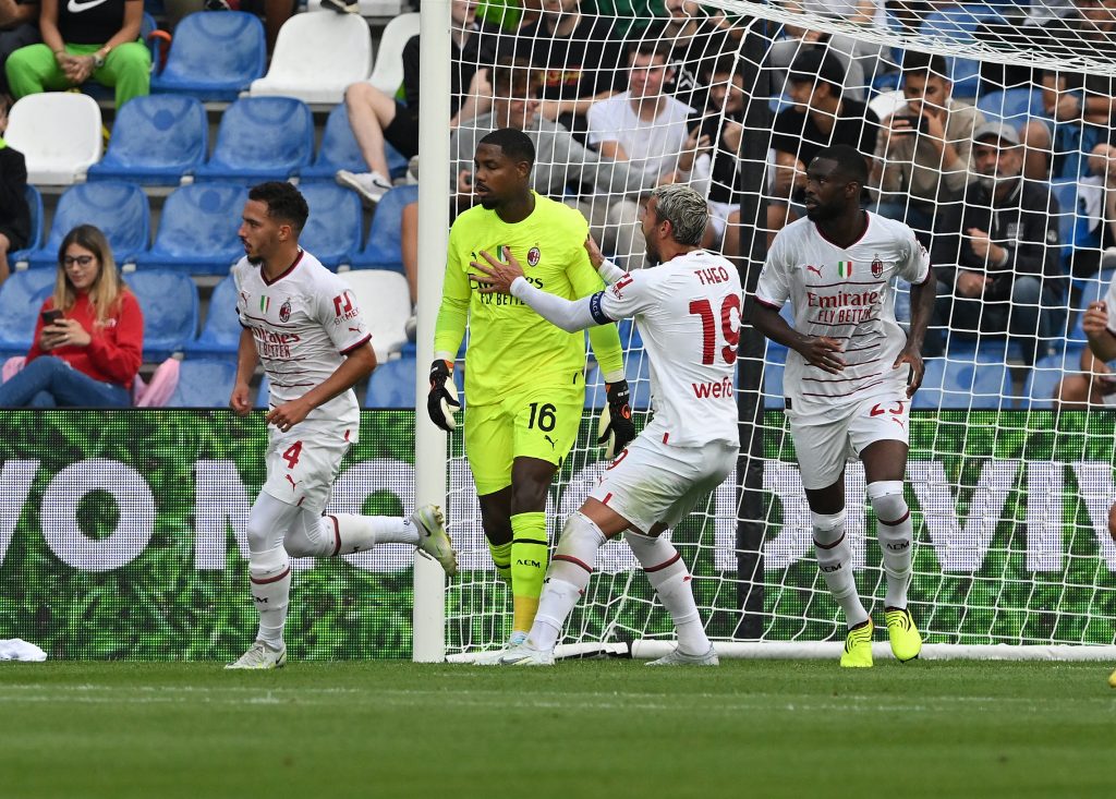 REGGIO NELL'EMILIA, ITALY - AUGUST 30: Mike Maignan of AC Milan reacts after saving a penalty kick during the Serie A match between US Sassuolo and AC Milan at Mapei Stadium - Citta' del Tricolore on August 30, 2022 in Reggio nell'Emilia, Italy. (Photo by Claudio Villa/AC Milan via Getty Images)