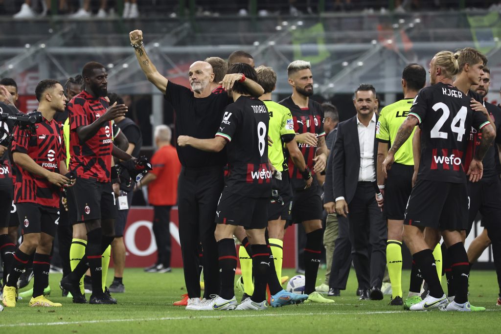 MILAN, ITALY - SEPTEMBER 03: Stefano Pioli Head coach of AC Milan and Sandro Tonali celebrates the win at end of the Serie A match between AC Milan and FC Internazionale at Stadio Giuseppe Meazza on September 03, 2022 in Milan, Italy. (Photo by Giuseppe Cottini/AC Milan via Getty Images)